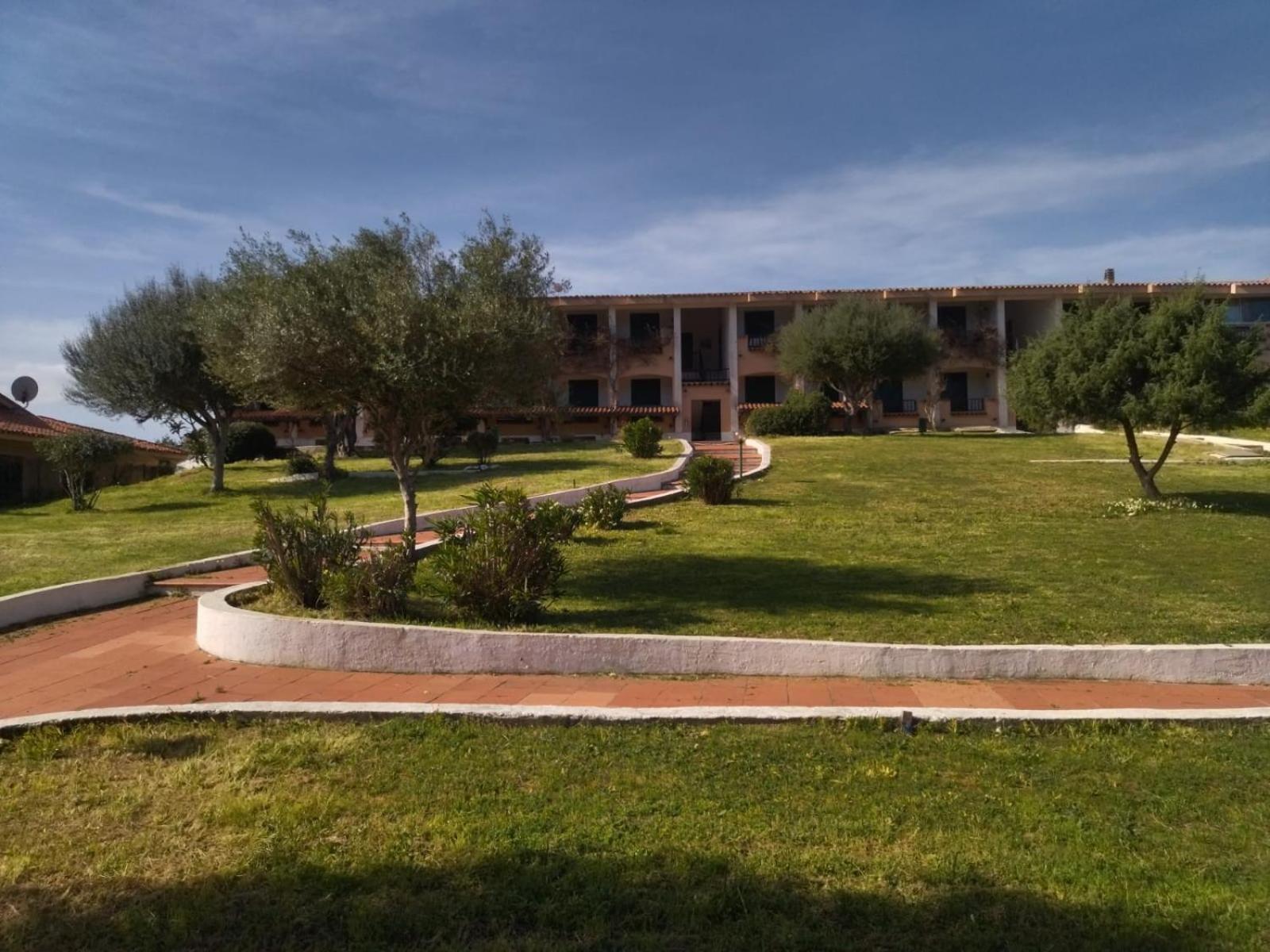 Residence Pinnetta Cala Bitta Baja Sardinia Exterior photo